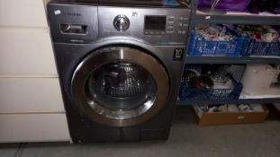 A Samsung WD906U45AGD eco bubble 9/6kg Sliver washing machine - Collection Only