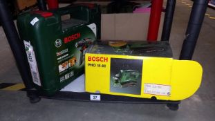 A Bosch Hammer Drill and A Planer - Both Boxed