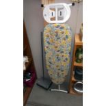 An ironing board and carpet sweeper - collect only