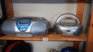 A JVC radio CD player and Wharfdale CD player