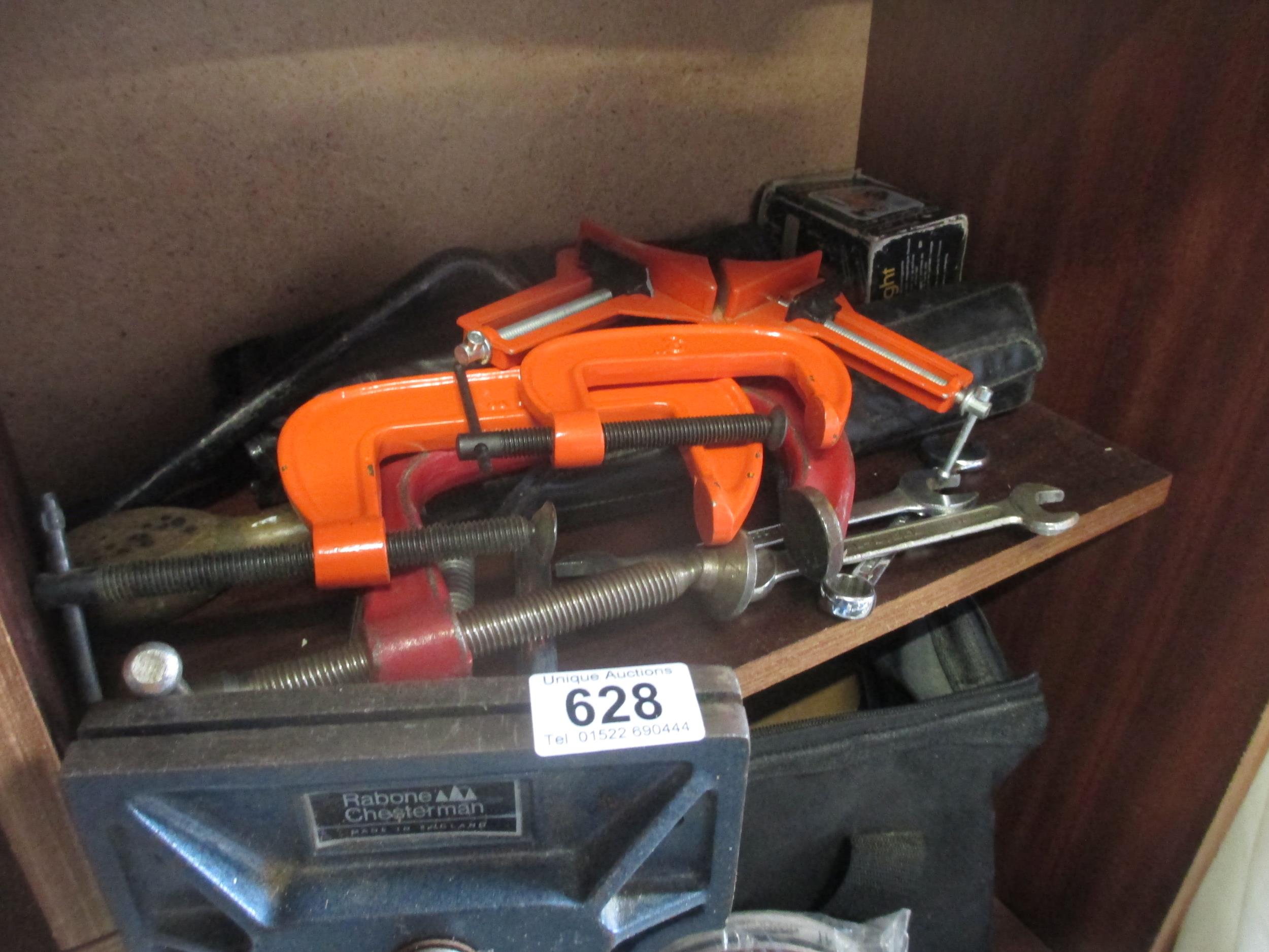 A quantity of clamps etc