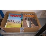 A Box of Wings Magazines and Aircrafts