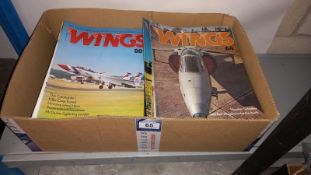 A Box of Wings Magazines and Aircrafts