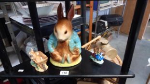 A Peter Rabbit biscuit Jar (2 chips to inside of base) plus Peter Rabbit figure and Bunnikins