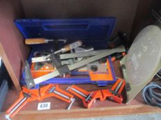 A quantity of picture framing clamps and a boxed Ronson blowtorch