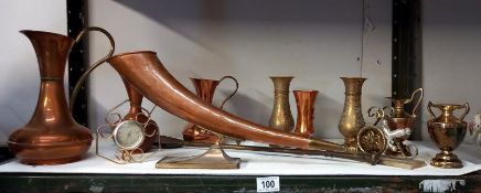 A selection of copper and brass including jugs, letter rack, hunting horn etc.,