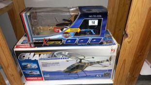 A Boxed Syma Champion R/C Helicopter and 1 other - unchecked