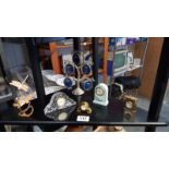 A selection of 4 miniature clocks