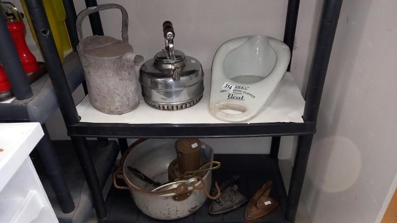 A vintage small galvanised watering can, jam pan, cast iron flat irons & balance scales etc.