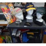 A quantity of Bretlins advertising items (2 shelves, heads not included)