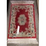 A Chinese 100 % wool carpet 91/61cm - Collection only