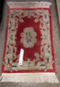 A Chinese 100 % wool carpet 91/61cm - Collection only