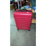 A Red Featherstone hard suitcase on wheels - Collection only