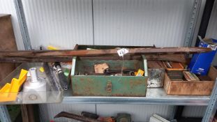 A shelf of tools including large pry bars COLLECT ONLY