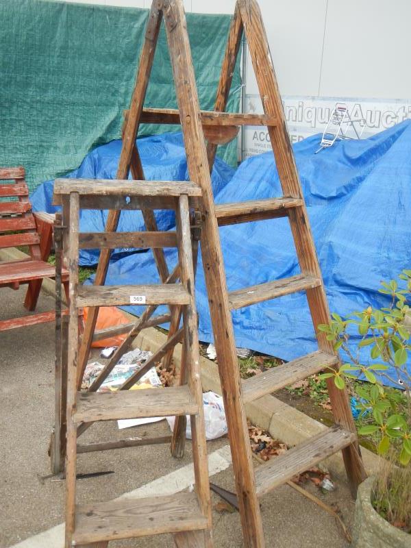 2 wooden step ladders