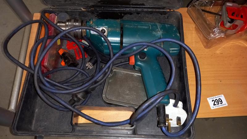 A Black and Decker cordless reciprocating hand saw and a Black and Decker corded drill - Image 2 of 3