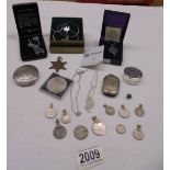 Two Celtic necklaces, a maple leaf brooch and a quantity of coins made in to pendants,