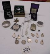 Two Celtic necklaces, a maple leaf brooch and a quantity of coins made in to pendants,