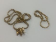 An 18ct gold chain with 18ct gold elephant pendant (with 18ct gold chain part) 15.18g