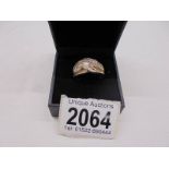 A 9ct gold ring set baguette diamonds, size P, 6 grams total.