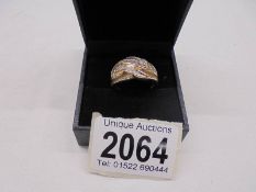 A 9ct gold ring set baguette diamonds, size P, 6 grams total.