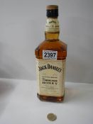 A bottle of Jack Daniels Tennessee Honey whisky.