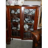 A good lead glazed two door display cabinet, COLLECT ONLY.