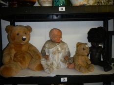 Two vintage dolls and two teddy bears.