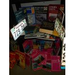 A quantity of car manuals, Ordnance Survey maps etc.,