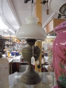 A brass oil lamp with mushroom shade, COLLECT ONLY.