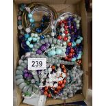 A mixed lot of beaded necklaces.