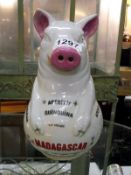 A novelty French Madagascar water jug in form of a pig
