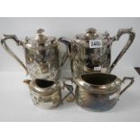 A four piece silver plate tea set.