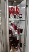 Approximately 25 pieces of red glass including sundae dishes. COLLECT ONLY.