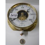 A pressure gauge by Schaffer & Budenber Ltd., of London, Manchester & Glasgow.