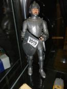 A vintage Louis Marx Knight in armour figure, 30 cm tall.