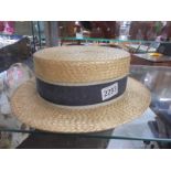 A vintage straw boater.