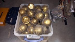 A large box of brass bed knobs and caps for restoration of Victorian beds COLLECT ONLY