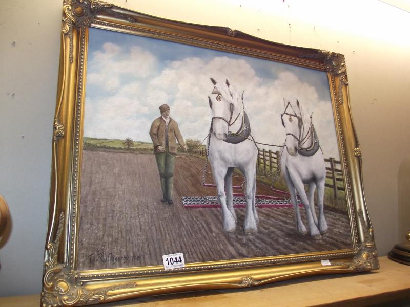 A gilt framed painting on canvas of heavy horses at work 54cm x 70cm COLLECT ONLY