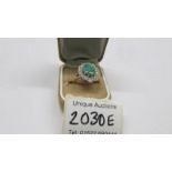 An 18ct gold opal and diamond ring, size M, total weight 6.8 grams.