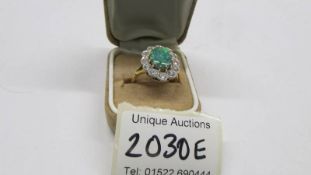 An 18ct gold opal and diamond ring, size M, total weight 6.8 grams.