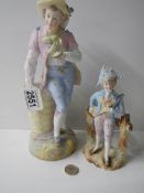 Two continental bisque porcelain male figures.