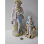 Two continental bisque porcelain male figures.