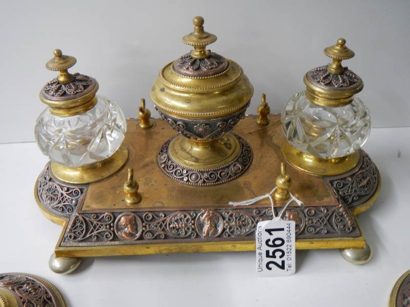 A late Victorian gilt bronze desk stand with matching inkwells and candlesticks. - Image 2 of 7