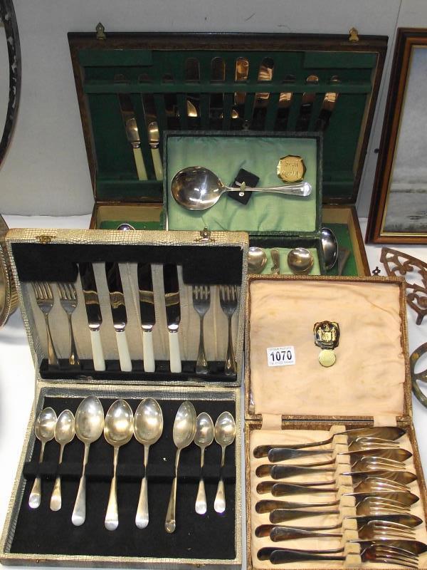 4 sets of cased cutlery (1 is incomplete)