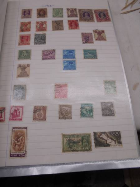 A large folder of UK stamps up to 2000 and a large folder of world stamps. - Image 6 of 17