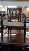 A 19th/20th century oak carver chair with spindle back & rope twist seat, COLLECT ONLY