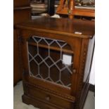 A dark oak display cabinet with leaded glass door, COLLECT ONLY