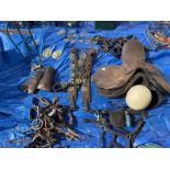 A good collection of horse related items including saddles, brasses etc