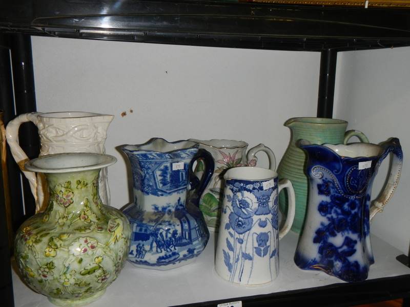 A mixed lot of jugs including blue and white, COLLECT ONLY.
